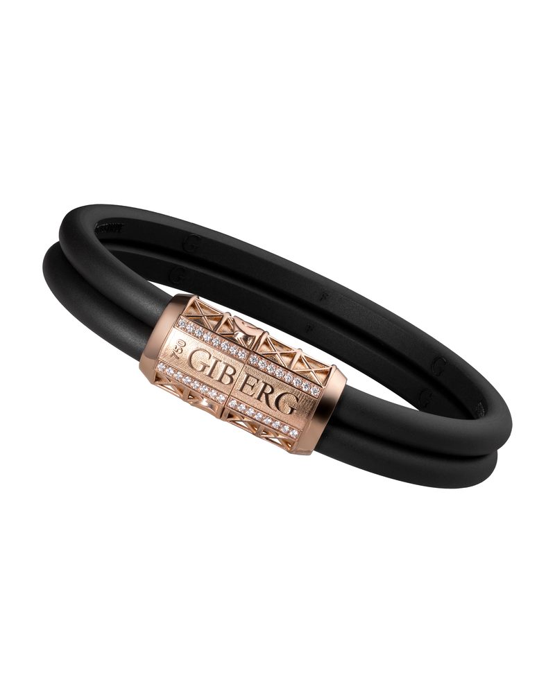 Black cord bracelet with an openwork rose gold clasp